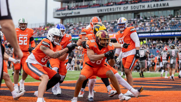 Brevyn Spann-Ford celebrates his touchdown catch